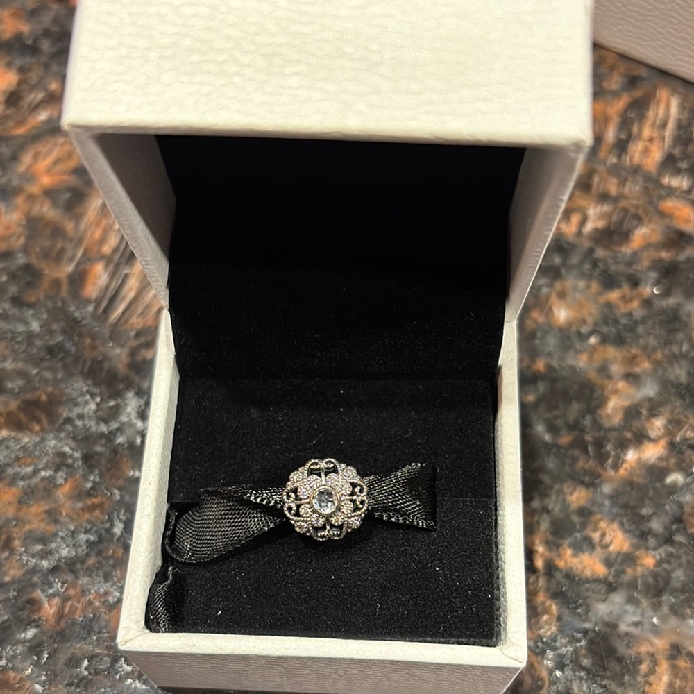 Elegant Silver Floral Pandora charm with blue stone NIB